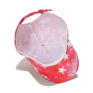 Close-up of pink star pattern baseball cap with adjustable snapback and polyester lining