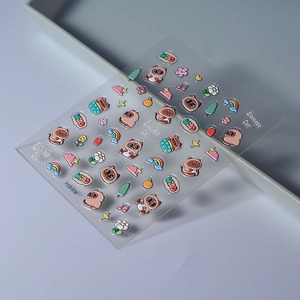 Detail of 3D embossed nail stickers featuring Siamese cats, rainbows, and floral patterns