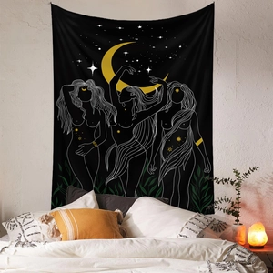 Detail of bohemian moon goddess tapestry featuring celestial patterns and female figures