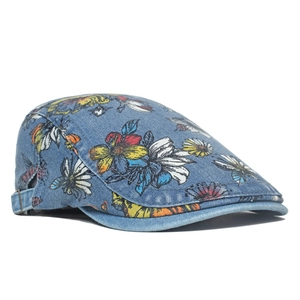 Detail view of denim ivy cap featuring peony floral prints and adjustable side buckle