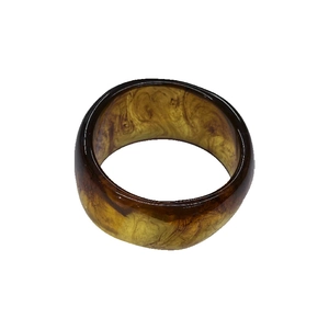 Maillard irregular wide resin bangle with amber marble texture for a retro chic look