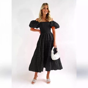 Women's black off-shoulder puff sleeve dress with tiered skirt and ruched bodice