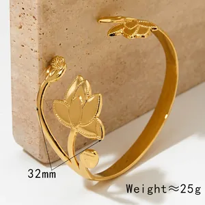 Adjustable golden stainless steel open bangle featuring a 32mm lotus flower design