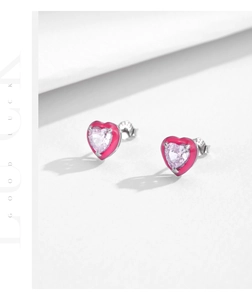 Detailed macro view of S925 sterling silver pink heart earrings with sparkling zircon stones