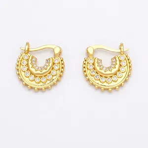 Gold-plated triangle huggie earrings with layered cubic zirconia and beaded detailing