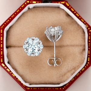 Classic silver flower stud earrings with sparkling cubic zirconia in a red gift box