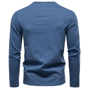 Rear view detail of a slim-fit men's long-sleeve cotton T-shirt in steel blue