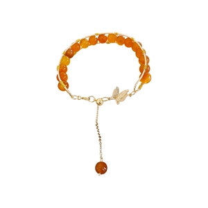 Vintage beaded butterfly bracelet with orange tiger eye stones in a classic Chinese style