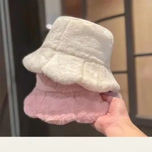 Plush faux rabbit fur bucket hat for women in soft white and pink winter colors