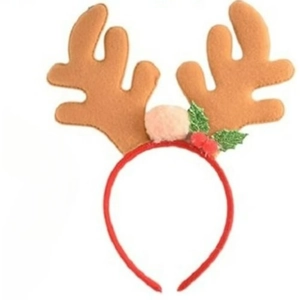 Detailed view of red Christmas headband with brown reindeer antlers and festive berries