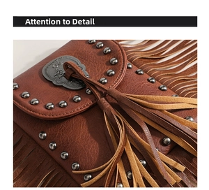 Detail of brown leather fringe bag featuring silver rivets and vintage floral metal buckle