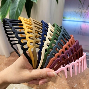 Set of matte colorful wide headbands with wavy teeth for hair styling and washing