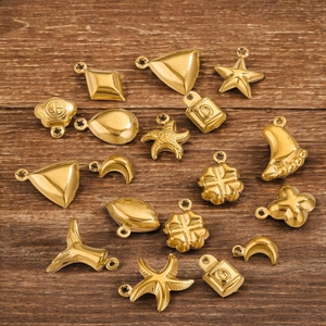 Variety of 18K gold plated stainless steel sea shell and heart charms for DIY jewelry making