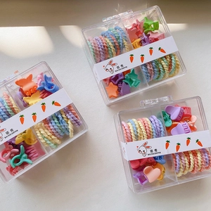 Colorful kids hair accessory set with butterfly clips and ties in a four-grid storage box