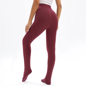 Detail of high-waist burgundy fleece leggings with wide tummy control waistband