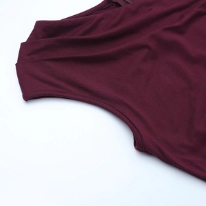 Detailed close-up showing precision stitching and fabric texture of the burgundy evening dress