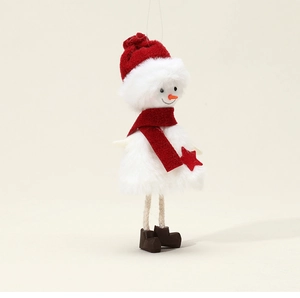 Close-up of plush snowman ornament with red hat and star detail on beige background