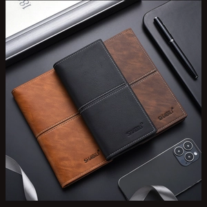 Detailed view of slim leather wallets in black and brown with fine stitching and branding