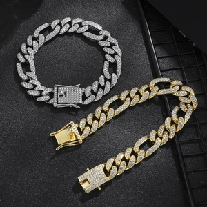 Iced out 14mm Cuban link chains in gold and silver finish with diamond accents