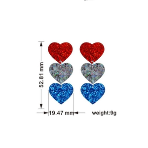 Detail view of USA striped acrylic glitter heart earrings showing 52.81mm length and 9g weight