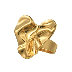 Irregular heart shaped 18K gold ring with vintage wavy texture on white background