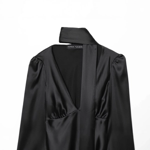Elegant black satin V-neck shirt for women featuring a stylish built-in scarf tie design
