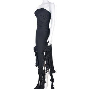 Detail view of black strapless dress with asymmetric ruffled layers and slim fit silhouette