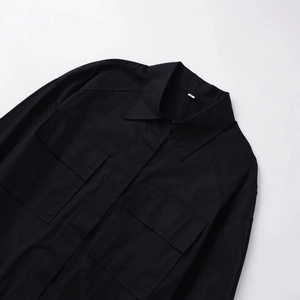 Women's black utility long sleeve shirt with double chest pockets and hidden buttons