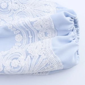 French style light blue blouse with lantern sleeves and white floral lace embroidery details