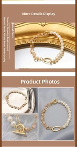 Detail view of natural pearls, amethyst beads and gold chain bracelet with OT clasp