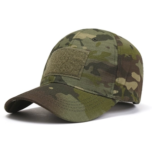 Macro detail of MultiCam tactical baseball cap featuring durable ripstop fabric and velcro patch