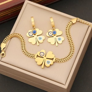 Golden stainless steel jewelry set with blue evil eye clover necklace and earrings