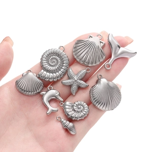 Silver stainless steel ocean charms featuring shell and starfish designs for DIY jewelry
