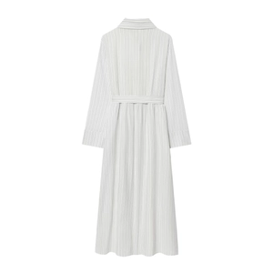 Detail view of the back of a striped long-sleeve dress with a matching fabric waist belt