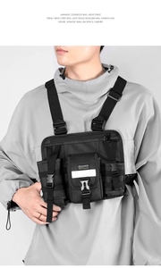 Detail view of tactical chest bag with adjustable straps and fashion sport label