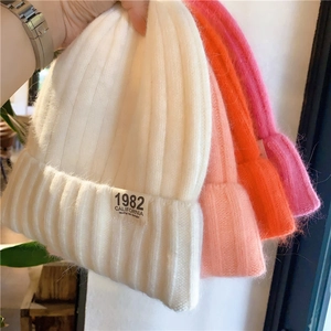 Winter fluffy knit beanies in white, pink, orange and rose with 1982 patch