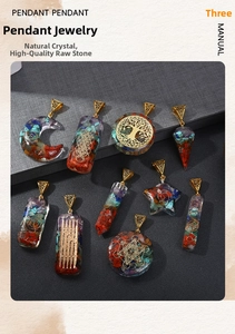 Macro detail of assorted healing chakra crystal pendants with intricate golden metal charms