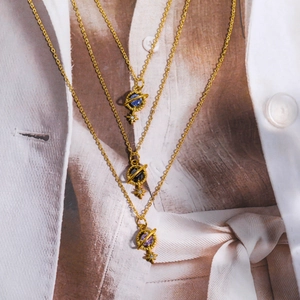 Vintage 18K gold stainless steel Saturn pendant necklace with zircon and star accents