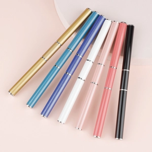Detailed view of dual-ended nail extension pens in seven vibrant metallic colors