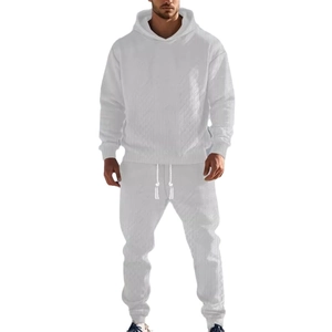 Men's white tracksuit with hoodie and sweatpants featuring diamond jacquard texture