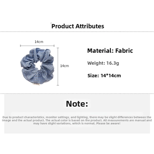 Detail showing blue plaid scrunchie with AYdre label and 14cm size specifications