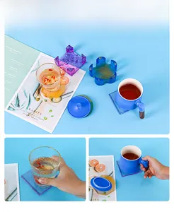 Detail of square and floral resin coasters with glitter inserts and storage rack