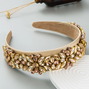 Serre-tête baroque de luxe avec strass champagne et cristaux sur tissu satiné