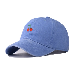 Washed light blue cotton baseball cap with red cherry embroidery and curved brim