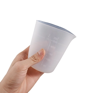 Close-up of 250ml translucent silicone measuring cup with embossed scale markings