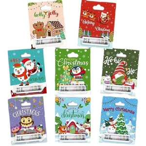 Christmas lip balm gift card set with festive Santa and reindeer designs in a 4x2 grid layout
