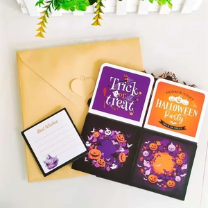 Macro view of 3D Halloween greeting cards with envelopes and Best Wishes tags