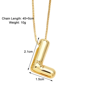 Detailed view of gold letter L pendant with dimensions 2.1cm by 1.5cm on a chain