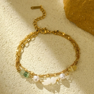 Layered 18K gold-plated stainless steel bracelet with white pearls and green gemstones