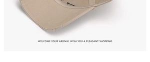 Close-up of khaki baseball cap brim showing high-density cotton twill and neat embroidery